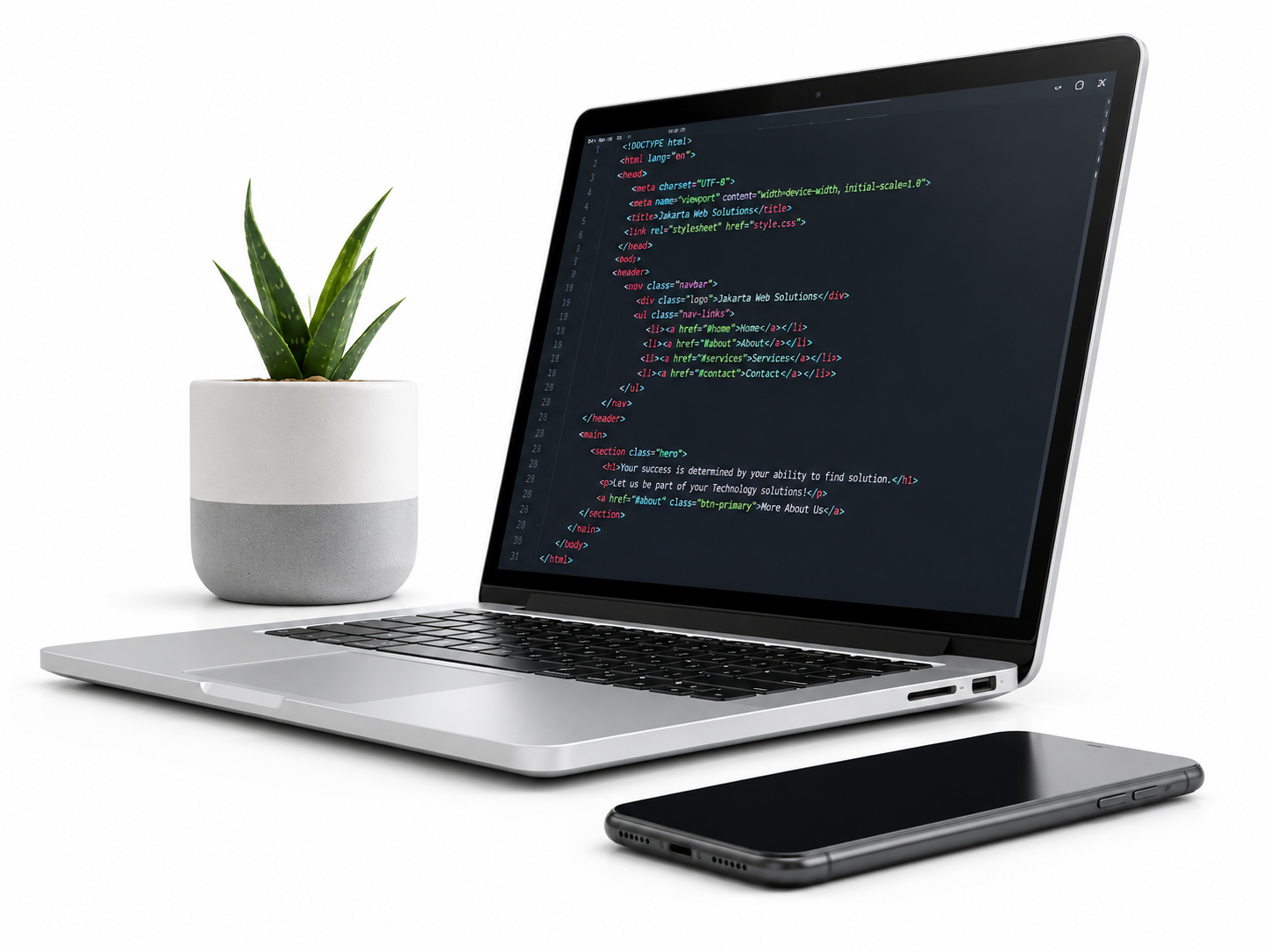Laptop showing Jakarta Web Solutions website code